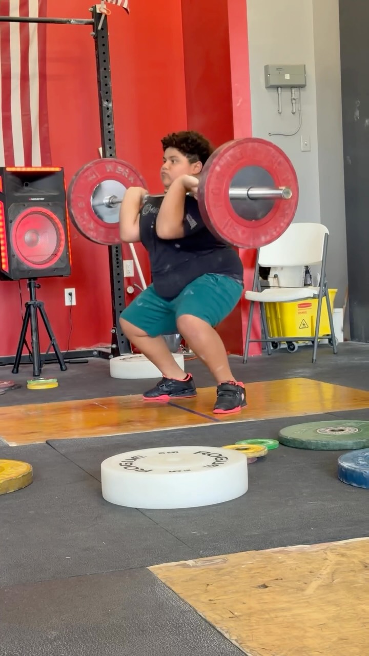Youth athlete training the clean